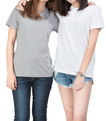 Two girls wearing t-shirt with white background. Clipping path