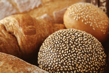 Bread background, closeup of white, black and rye loaves