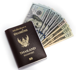 Dollar banknote and Thailand passport on isolated white background