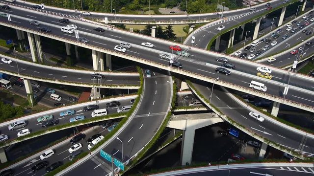 Aerial View of freeway busy city rush hour heavy traffic jam highway,shanghai Yan'an East Road Overpass interchange.