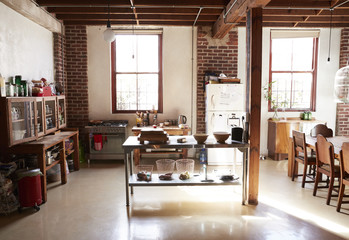 Serving table in the kitchen dining room of a loft apartment