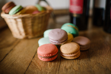 vivid color macaroons on wooden table