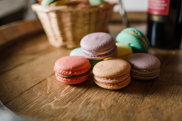 vivid color macaroons on wooden table