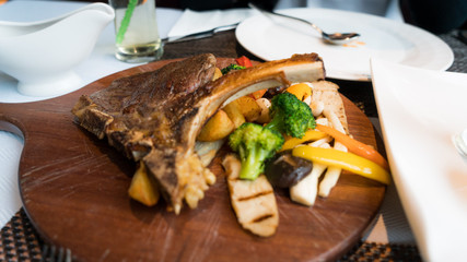 Delicious Austrian Beef Steak on a wooden plate