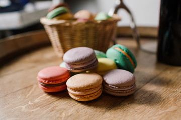 vivid color macaroons on wooden table