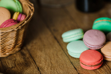 vivid color macaroons on wooden table
