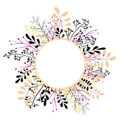 Round frame in the form of a wreath of multi-colored leaves and grass on a white 