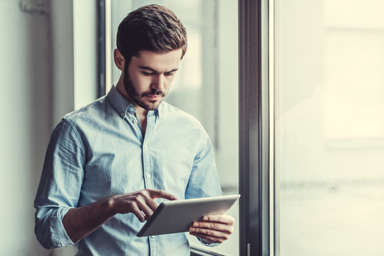 Man With Tablet