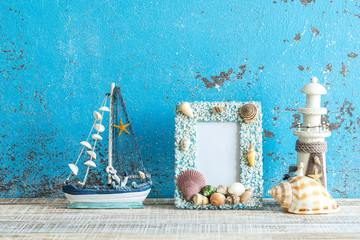 Fototapeta na wymiar Decorative marine items on wooden background.