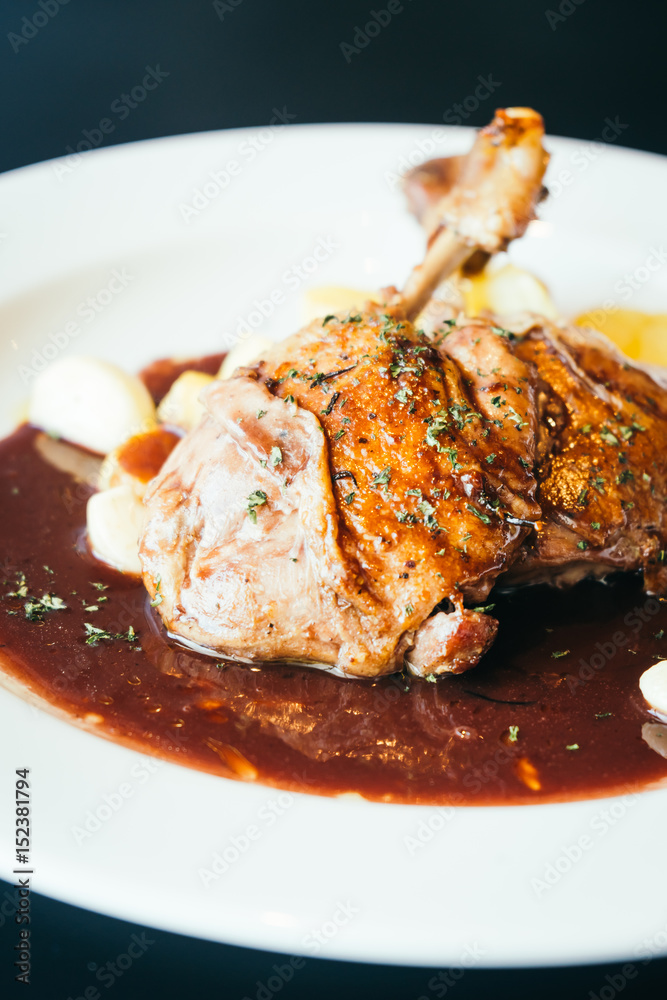 Sticker duck breast steak in white plate