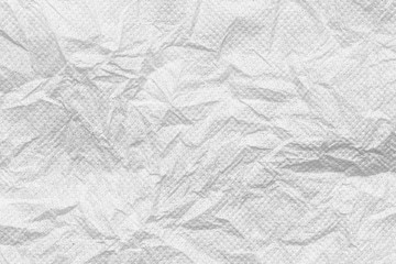 Crumpled white paper texture background.