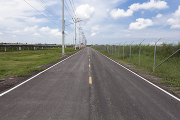 Asphalt road in solar farm.