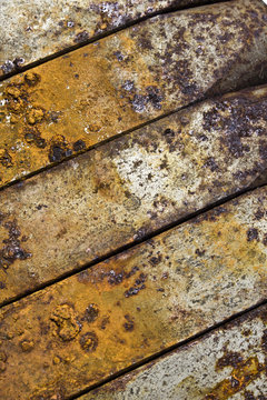 Abstract Close Up of Rusted Metal Pegs in a Row