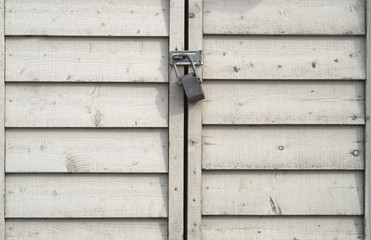 padlock doors horizontal beige planks lock