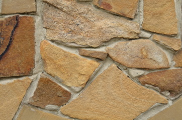 
Fragment of the texture of the wall, composed of a large quarry stone.