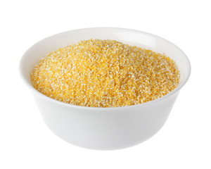 corn grits in a bowl on white background
