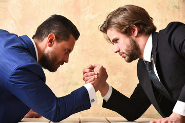arm wrestling of businessman and compete man - obrazy, fototapety, plakaty