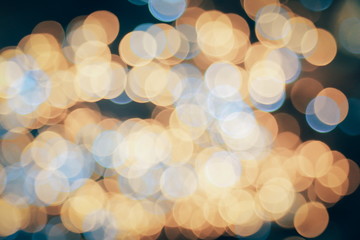 Color Blurred background : Bokeh lighting in concert with audience , texture dot copy space,music performance concert with bokeh spotlight. entertainment concert lighting on stage,blurred disco party.