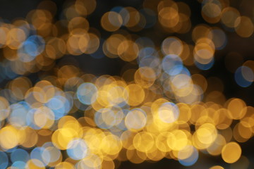 Color Blurred background : Bokeh lighting in concert with audience , texture dot copy space,music performance concert with bokeh spotlight. entertainment concert lighting on stage,blurred disco party.