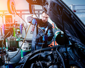 Engine oil change. Car repair.