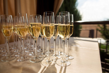 Champagne glasses on alcohol party