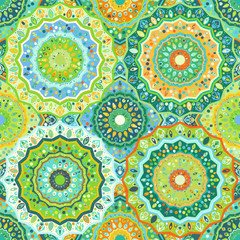 Seamless pattern imitating a mosaic. Multicolored dynamic background with elements of ornament. Patterns for edible icing sheets for covering cakes.