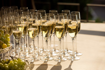 Rows of champagne glasses for congratulation and celebration