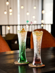 cold soda drink on wooden table in restaurant.