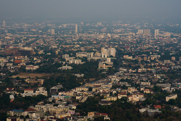 bird eye view rooftop of habitat for humanity under toxic smoke.