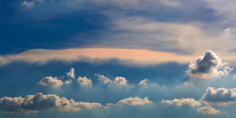 Rainbow cloud phenomenon or Irisation in clouds