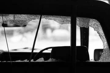 Car crash, shattered glass, low light image concept