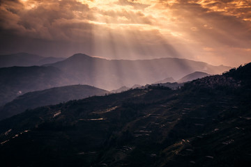 Fototapeta premium Misty morning with sunrise over forest mountain,Beautiful landscape at Doi Ang Khang,Chiang Mai,Thailand.