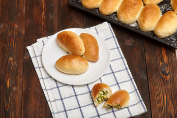 Homemade baked patties or pies with ramson, wild garlic