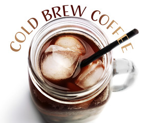 Iced coffee in glass jar on white background
