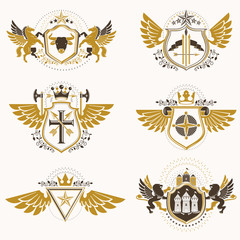 Obraz premium Vintage heraldry design templates, vector emblems created with bird wings, crowns, stars, armory and animal illustrations. Collection of vintage style symbols.