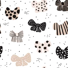 Poster Seamless hand drawn pattern with bows. Fashion trendy texture.Great for fabric and textile. Vector Illustration © solodkayamari