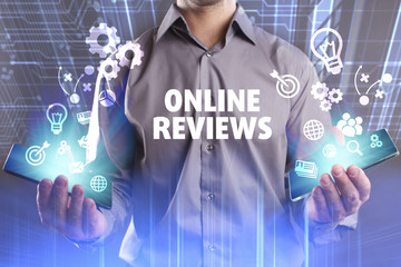Business, Technology, Internet and network concept. Young businessman working on a virtual screen of the future and sees the inscription: Online reviews