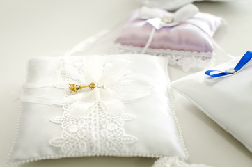 Fototapeta na wymiar Beautiful pads for wedding rings. Close-up, soft focus.