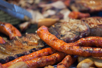 Grilled meat on a hot grill.