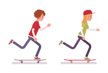 Skateboarder boy and girl, riding in motion