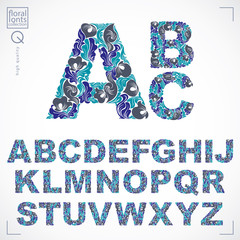Ecology style flowery font, blue vector typeset made using natural ornament. Alphabet capital letters created with spring leaves and floral design.