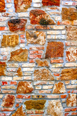 Naklejka premium Rough grunge natural stone-brick wall pattern