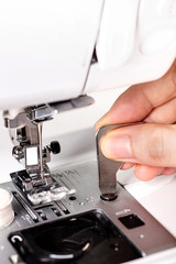 close up of repair the sewing machine