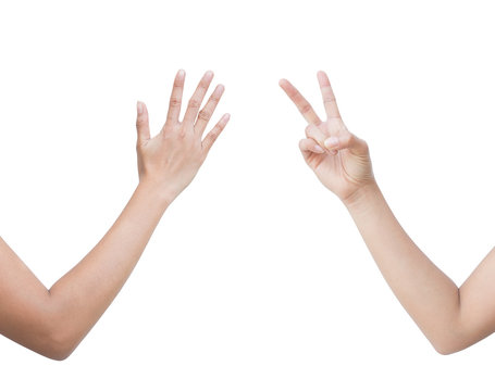 The right back and front side hand of the woman show Rock Paper Scissors sign for find the winners fair in the game. show paper and scissors sign. isolated on white background.