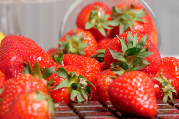 Strawberries with a dark chocolate bar