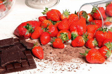 Strawberries with a dark chocolate bar