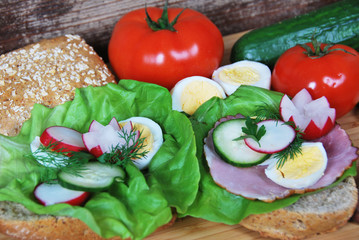 Delicious sandwich with ham and lettuce