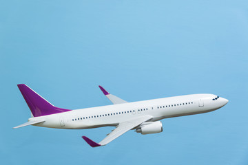 white airplane on a blue background