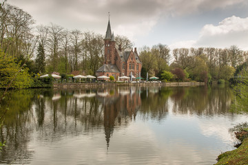 Fototapeta na wymiar Reflections in Lover's Lake, Bruges, Belgium