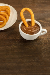 Photo of churros con chocolate, traditional Spanish dessert